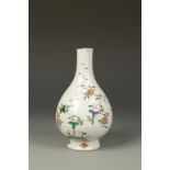 A CHINESE FAMILLE VERTE BOTTLE VASE, sparsely decorated with a blossoming foliage, Kangxi