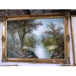 A 20TH CENTURY OIL ON CANVAS VIEW OF A WOODED RIVER SCENE, signed 'C Inness'