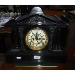 A 19TH CENTURY SLATE CASED MANTEL CLOCK OF ARCHITECTURAL FORM with visible escapement (key in