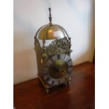 A REPRODUCTION BRASS CASE LANTERN CLOCK 16" high (including finial)