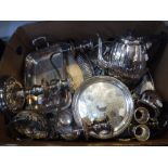 A LARGE QUANTITY OF ASSORTED PLATED WARES including candle holders, dinner wares and other items