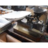 A SET OF AVERY GROCERY SCALES with enamel pan and weights and another similar set