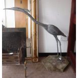 A LARGE CAST LEAD GARDEN STATUE in the form of a Heron, 41" high and the companion (2)