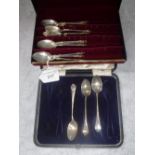 A COLLECTION OF SILVER APOSTLE SPOONS and three others