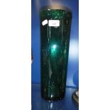 A TALL GREEN GLASS BUBBLE INCLUDED VASE, signed 'Hadeland'