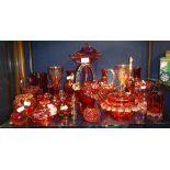 A LARGE COLLECTION OF CRANBERRY AND SIMILAR COLOURED GLASSWARE