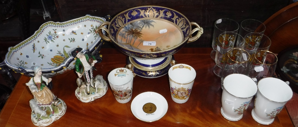 A NORITAKE TWO HANDLED BOWL on stand, two Continental ceramic figures, commemorative mugs, glasses