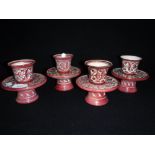 A SET OF PERSIAN STYLE CUPS ON STANDS signed E Ballon Blois