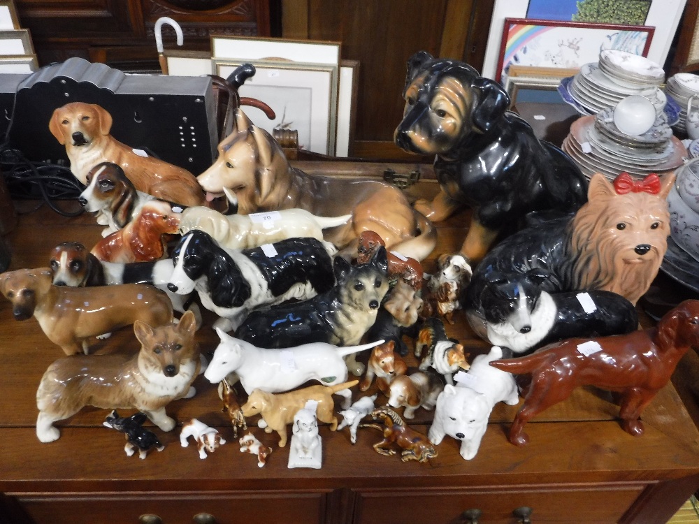 A LARGE COLLECTION OF CERAMIC DOGS