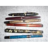 SIX VINTAGE FOUNTAIN PENS including a 'Swan Leverless', a Sheaffer green marbled example and others