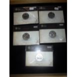 A COLLECTION OF ROYAL MINT TITANIC COMMEMORATIVE MEDALS in original packaging