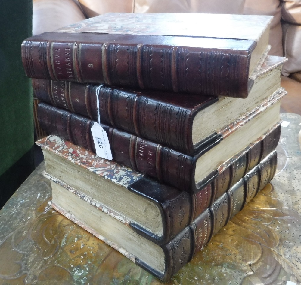 A NOVELTY ICE-BUCKET in the form of a pile of leather and marble paper bound books
