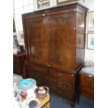 A 19TH CENTURY MAHOGANY LINEN PRESS with flame-figured doors 54" wide, a late Victorian walnut