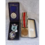 A GEORGE V SPECIAL CONSTABULARY MEDAL and two similar items