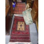 A PERSIAN PRAYER RUG, circa 34" x 60" and two similar rugs decorated with birds, approx. 32" x 60"