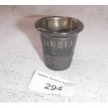 A WHITE METAL THIMBLE-SHAPED CUP engraved 'Just a Thimbleful'