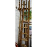 THREE ORIENTAL BAMBOO LADDERS, the longest, 126" the others, 102"