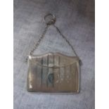 A SILVER CARD HOLDER with chain handle