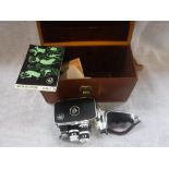 A VINTAGE BOLEX PAILLARD HAND HELD 8MM CINE CAMERA in a fitted leather case with instructions