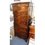 A REPRODUCTION SERPENTINE FRONT MAHOGANY CHEST ON CHEST of small proportions 28" wide