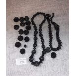 A COLLECTION OF CARVED BOG OAK JEWELLERY including floral carved necklace