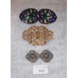 A GOLD FRONTED OPENWORK BUCKLE and two other buckles, one decorated with enamelled dragonflies (3)