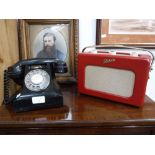 A VINTAGE BLACK BAKELITE TELEPHONE with 'Aptofone' receiver and a red cased Roberts Radio