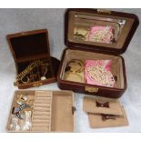 A COLLECTION OF COSTUME JEWELLERY in a fitted leatherette jewellery box