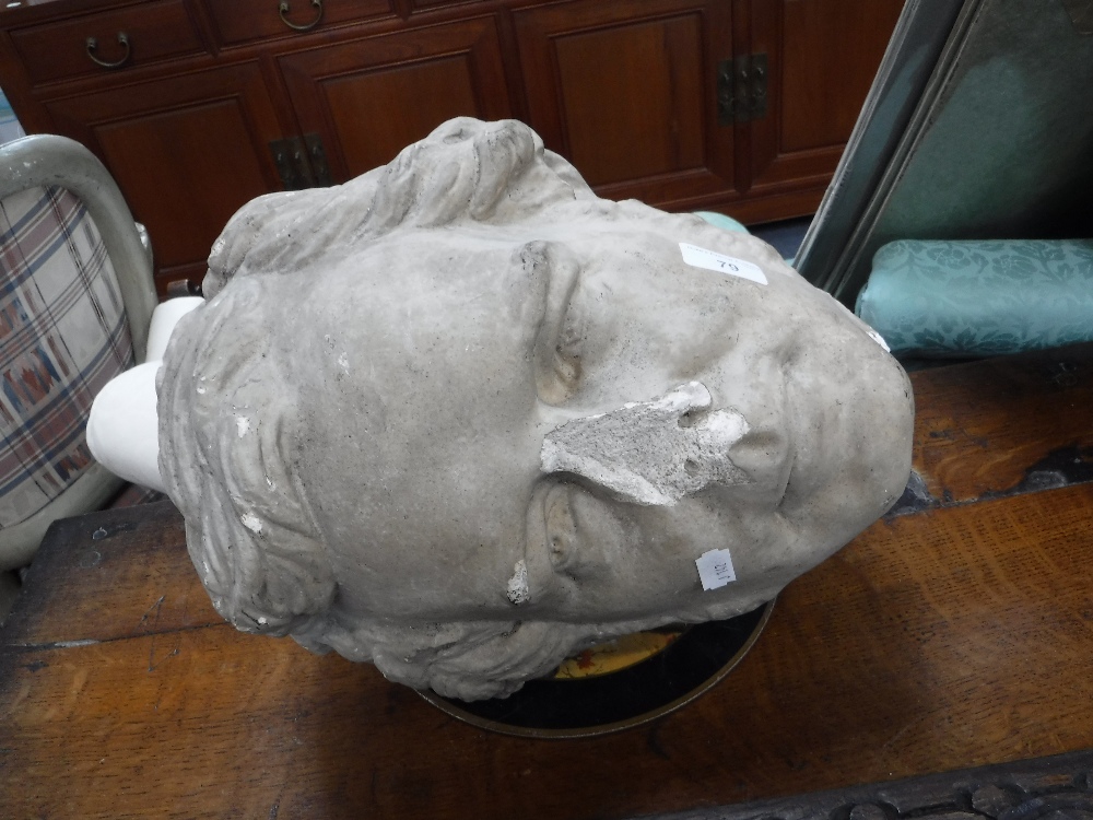 A LARGE PAINTED PLASTER HEAD of a young man 14" high (approx)