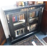 A VICTORIAN EBONISED DISPLAY CABINET with inlaid decoration and ormolu mounts 43.5" wide