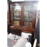 A LARGE LATE VICTORIAN WALNUT LIBRARY BOOKCASE 56" wide