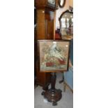 A 19TH CENTURY ROSEWOOD POLE SCREEN with needlework panel depicting a bird