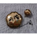 AN ORIENTAL BROOCH and a ball pendant (2)