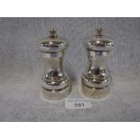 A MATCHING PAIR OF SILVER SALTS AND PEPPER GRINDER