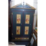 A 19TH CENTURY CONTINENTAL PAINTED PINE ARMOIRE, in dark blue/green, the panels painted in cream