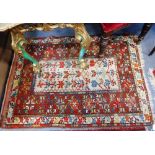 A SMALL PERSIAN RUG with all over geometric design, 34" x 47"