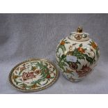 A TURKISH/HUNGARIAN LIDDED GINGER JAR AND PLATE with all over foliate decoration