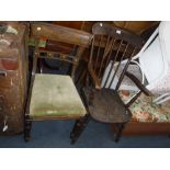 A 19TH CENTURY STICK-BACK KITCHEN ARMCHAIR and a Regency dining chair