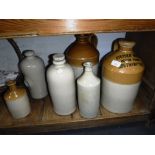 A VINTAGE STONEWARE FLAGON,'STEPHEN WHITE, BEVOIS TOWN, SOUTHAMPTON' and similar stoneware