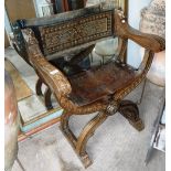 A 19TH CENTURY SPANISH WALNUT 'X' FRAME FOLDING CHAIR, with embossed and studded leather seat and