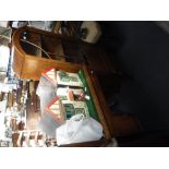 A 1930S GLAZED OAK DISPLAY CABINET and a small desk (2)