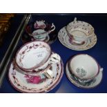 A SMALL COLLECTION OF VICTORIAN CUPS AND SAUCERS including a cup and saucer commemorating Victoria