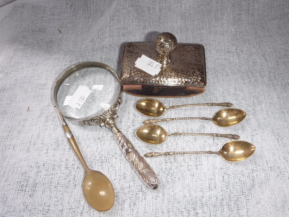 A SILVER HAND HELD MAGNIFYING GLASS and a collection of similar items