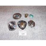 A COLLECTION OF WHITE METAL BROOCHES and a dress ring