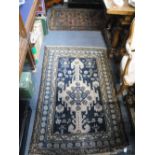 A PERSIAN DESIGN RUG, 32" X 47" and another rug, 39" x 61"