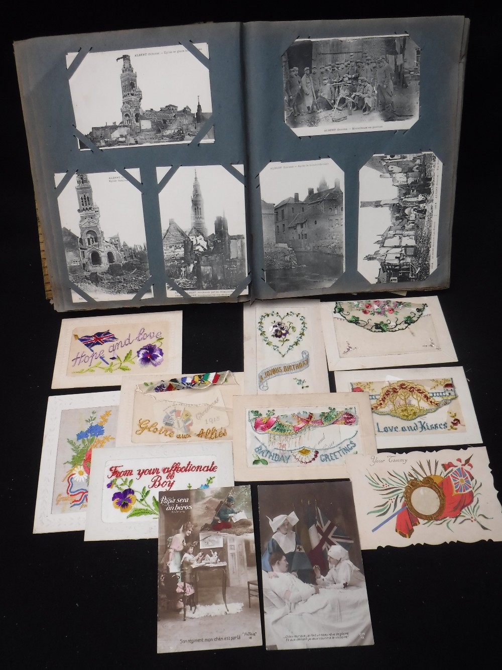 FIRST WORLD WAR INTEREST: A PERIOD POSTCARD ALBUM containing silk postcards (8) 'Papa sera un
