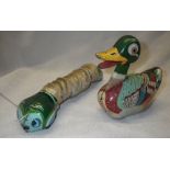DAIYA: A VINTAGE JAPANESE TIN PLATE PUSH-ALONG DUCK AND A CLOCKWORK CENTIPEDE Condition: the duck is