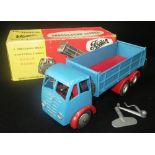 SHACKLETON TOYS: A MECHANICAL 'FODEN' F.G.6. TIPPER, in blue with red wings and lorry bed. with keys