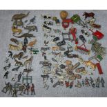 BRITAINS: A LARGE COLLECTION OF CAST METAL 'FARM' FIGURES, including farm vehicles, a haystack, cows