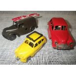 MINIC TOYS: A 1950S SPLIT SCREEN SALOON CAR IN RED, a similar brown van with roof ladder and a